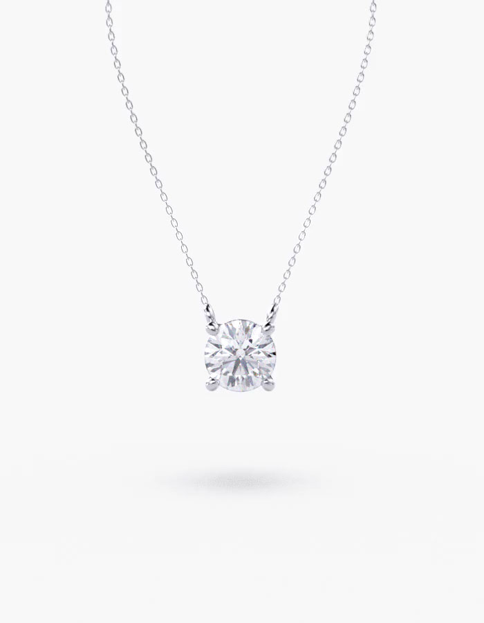 18k white gold round diamond pendant with 1 metal and r shape diamond