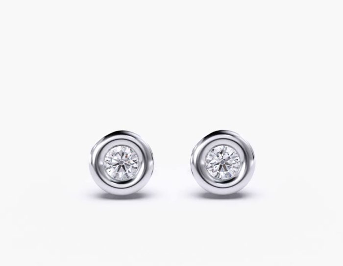 18k white gold round diamond stud encastrée earrings with 1 metal and r shape diamond